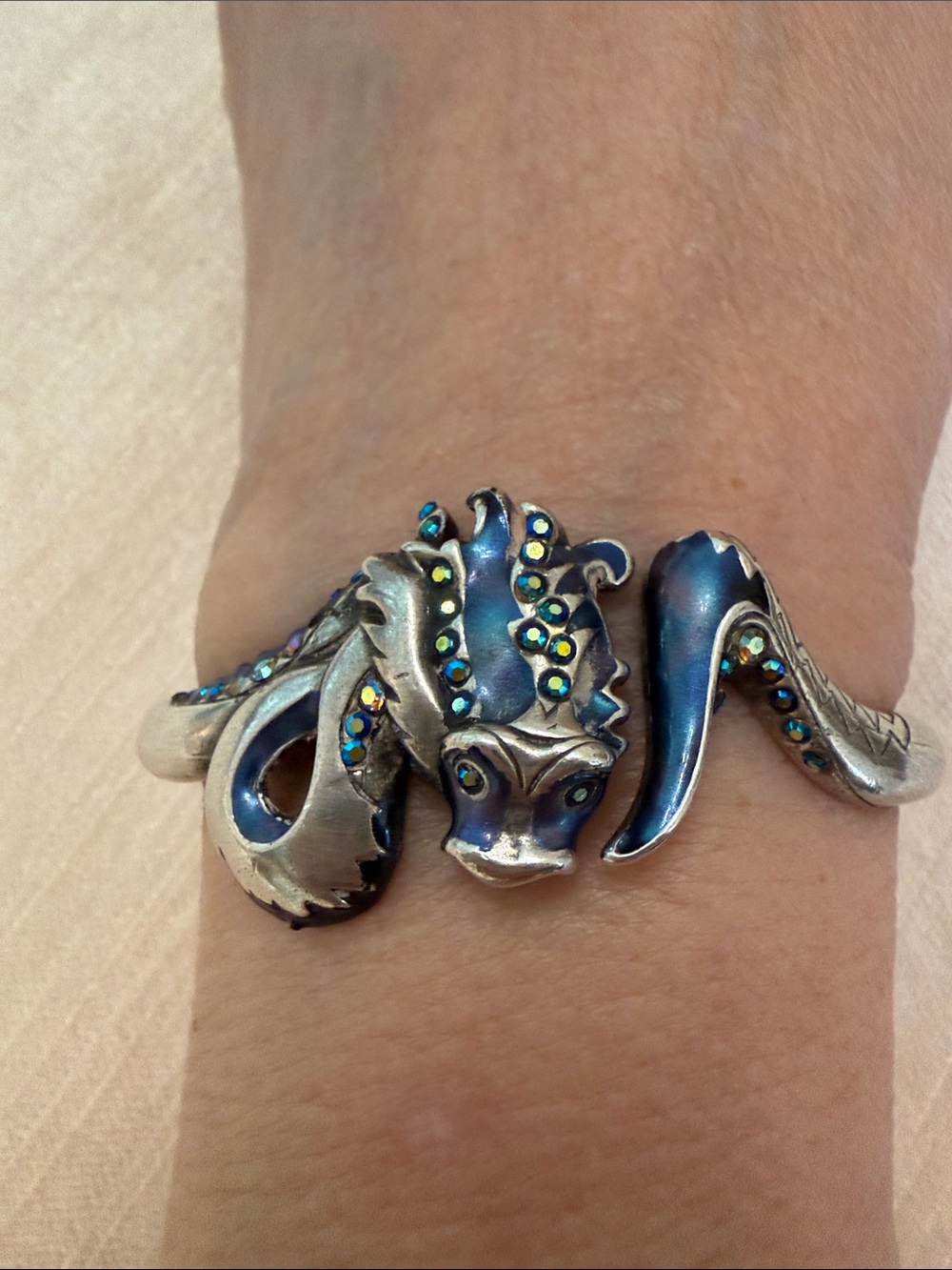 Chico’s water, dragon hinged Bracelet with Blue-Green Accents